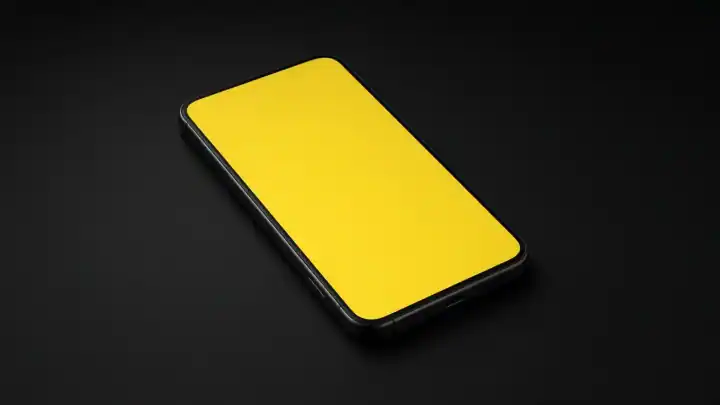 Generisches Smartphone mit gelbem Licht auf schwarzer Fläche